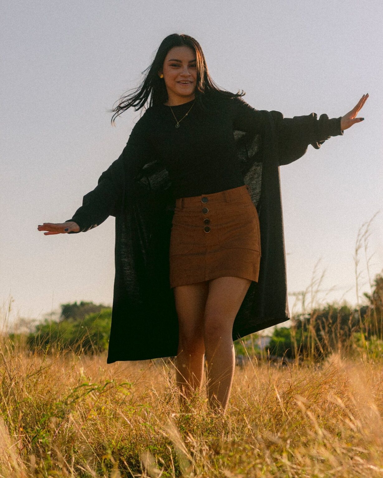 woman in long cardigan