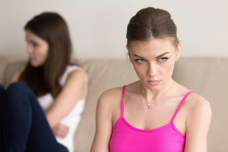 grumpy woman sitting offended girlfriend