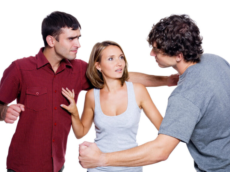 two aggressive men fight for a woman isolated white background