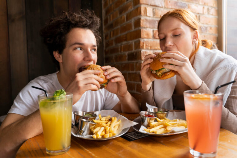 young adults enjoying food