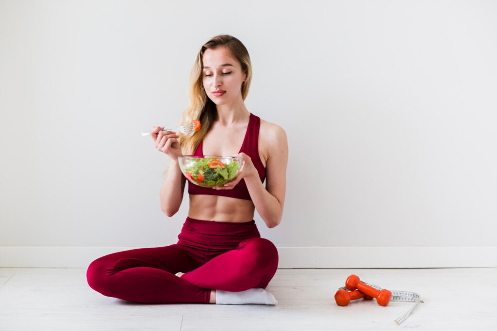 diet concept with sport woman healthy food