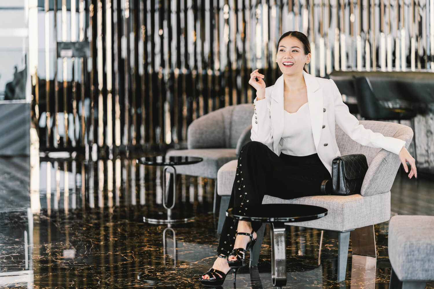 portrait asian business woman wearing formal suit sitting sofa modern lobby office cooking space coffee break leisure fashion lifestyle after working time business people concept
