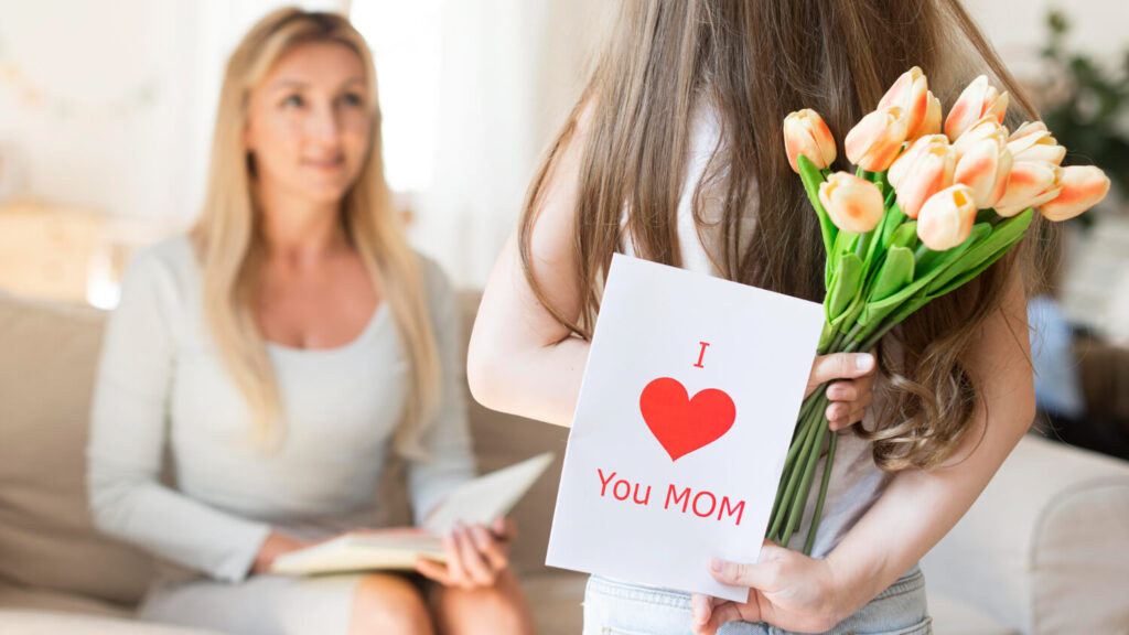 daughter surprising mother with tulips