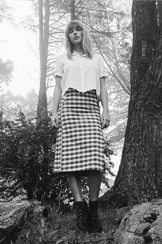 black and white photo of tylor swift:Folklore Outfits Taylor Swift