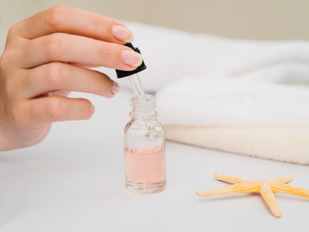 close up sideways pipette with spa oil