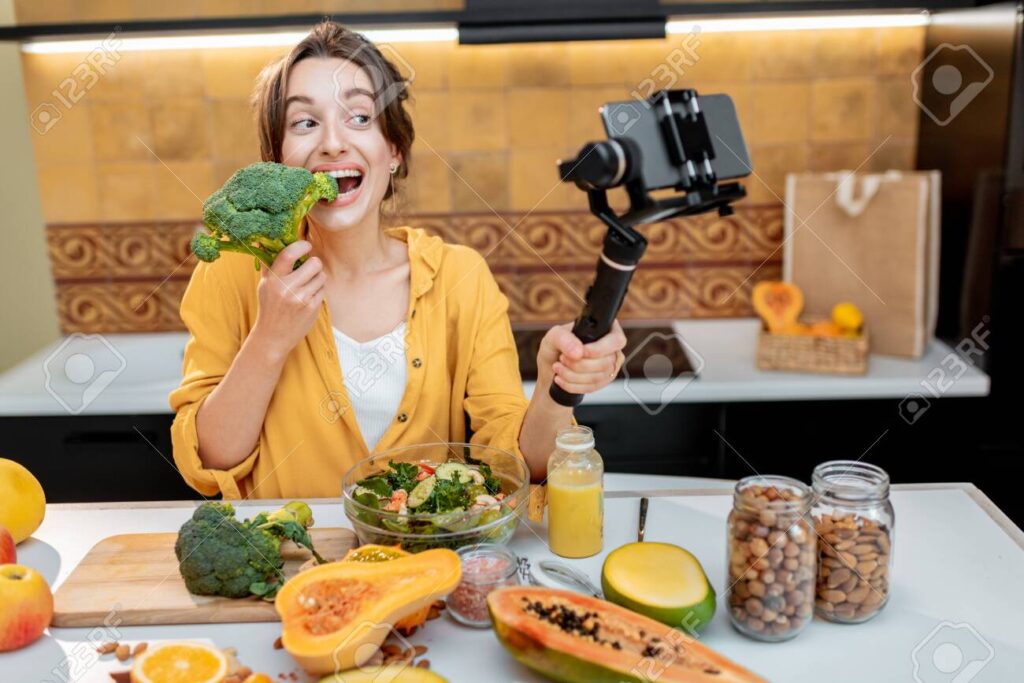 woman shooting food vlogs and pursuing as a hobby