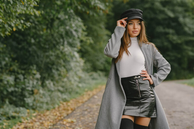 girl walks woman gray coat brunette with black cap